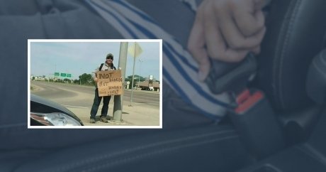 Driver gets $175 ticket for giving change to panhandler